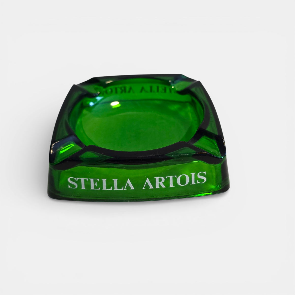 Green glass STELLA ARTOIS cigar ashtray, vintage, commonly used in cafes and bar