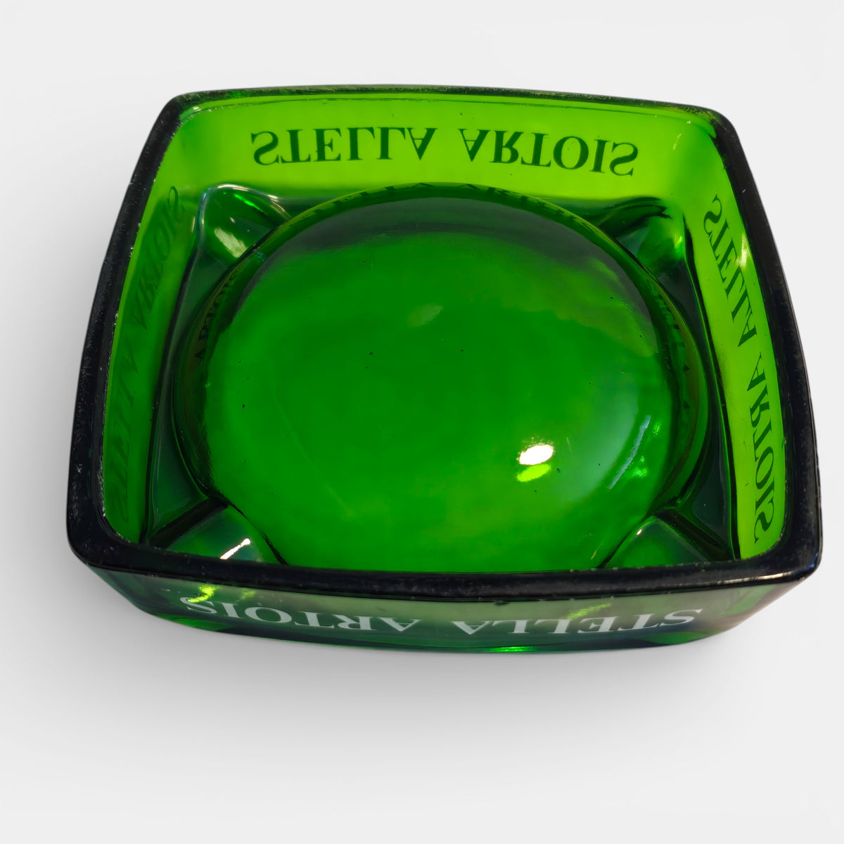 Green glass STELLA ARTOIS cigar ashtray, vintage, commonly used in cafes and bar