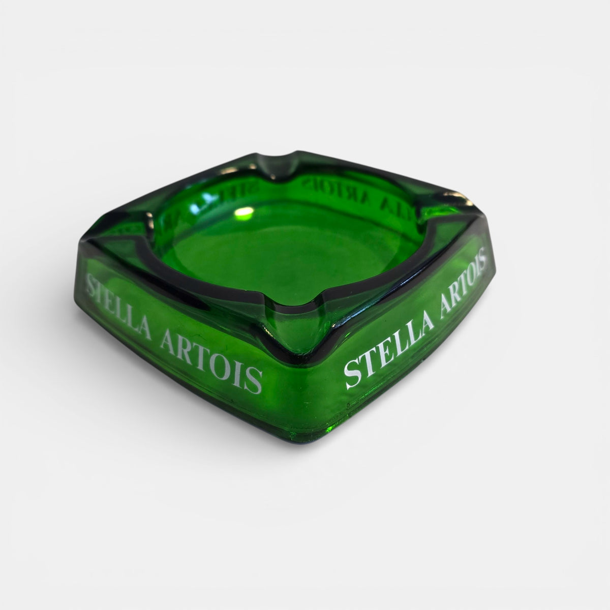 Green glass STELLA ARTOIS cigar ashtray, vintage, commonly used in cafes and bar